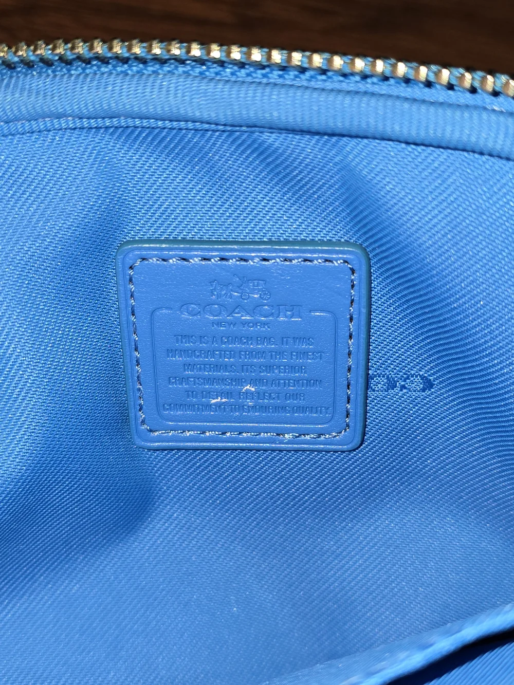 Coach Pebbled Leather Wristlet Bag in Sky Blue